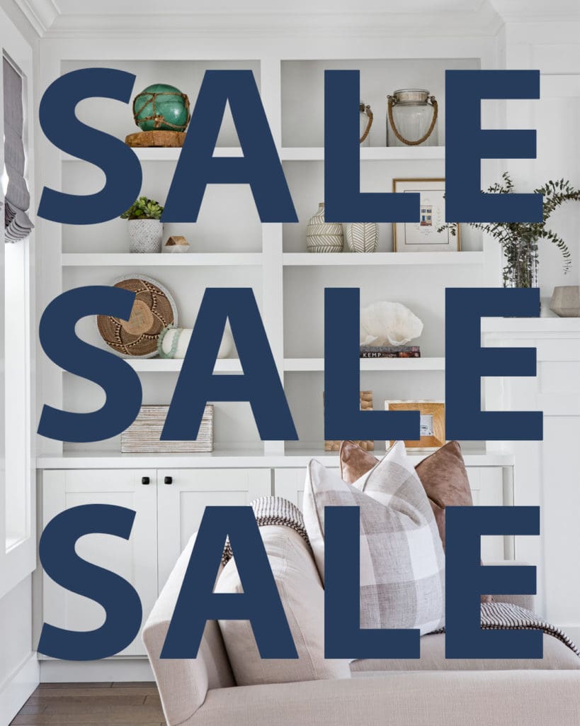 Sale text over stylish home interior shelves.