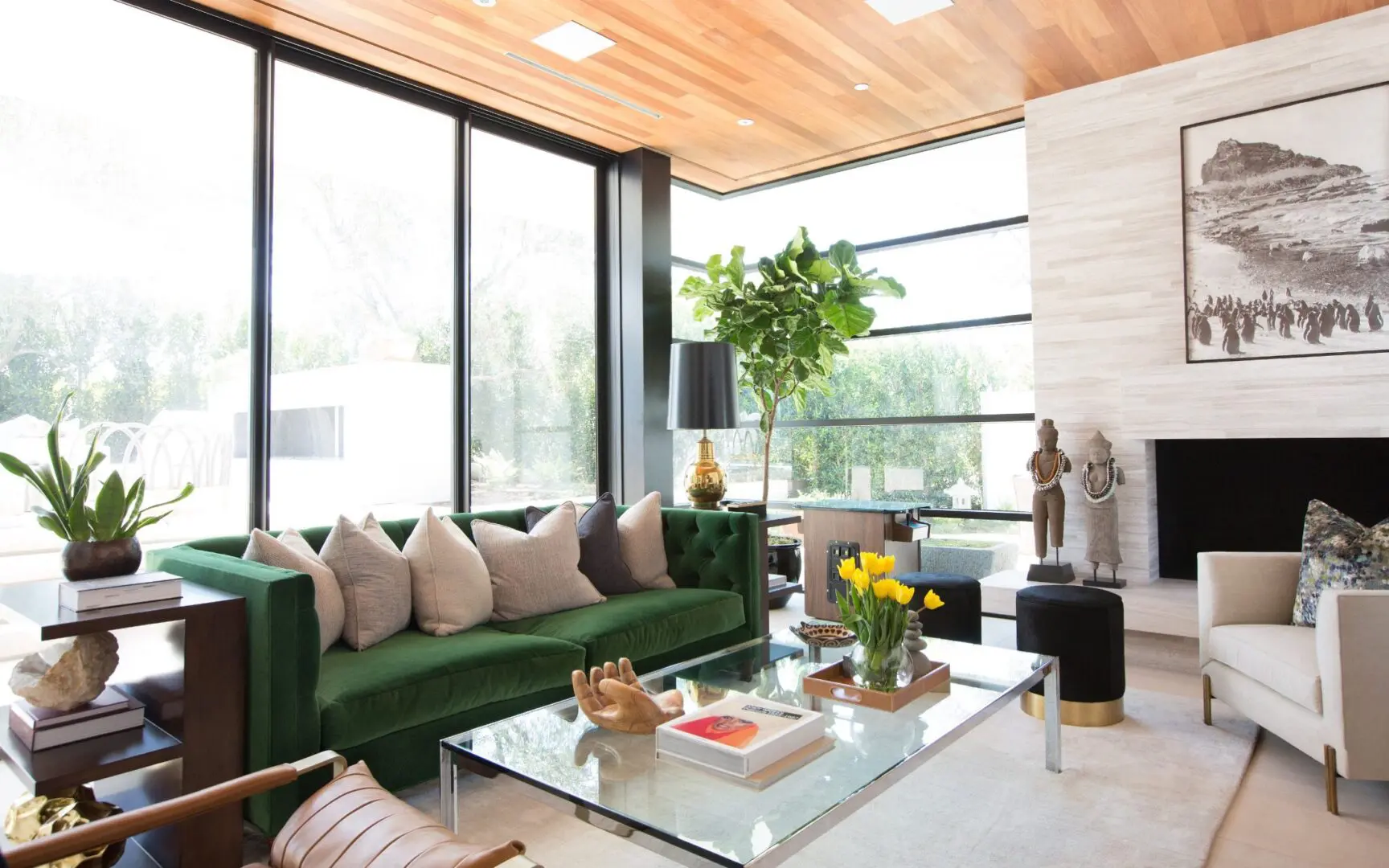 High-end contemporary living room with emerald green velvet sofa.