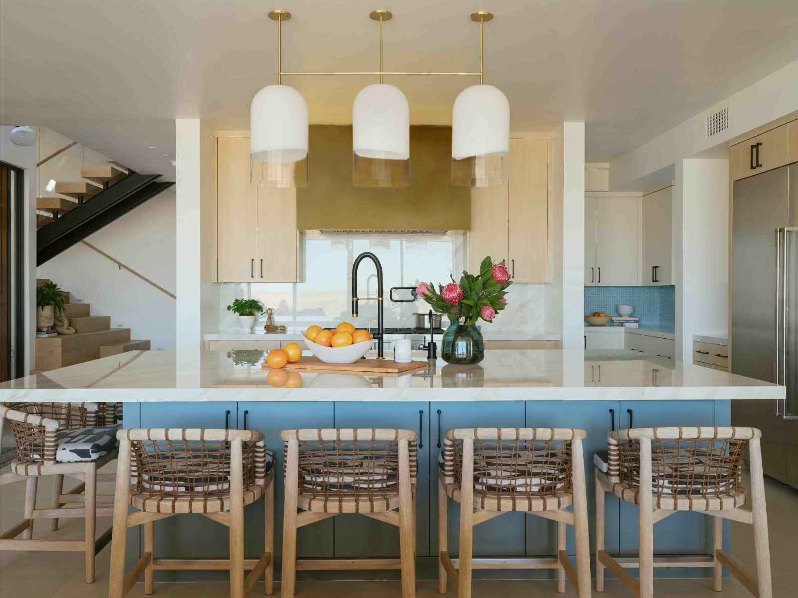 Modern kitchen island with bar stools.