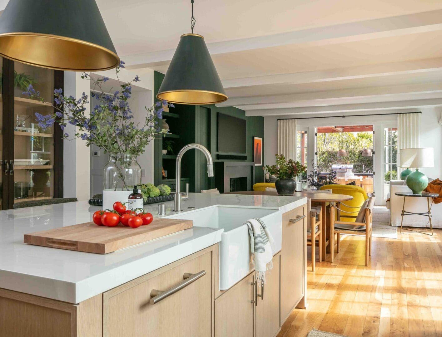 Modern kitchen island with farm sink.