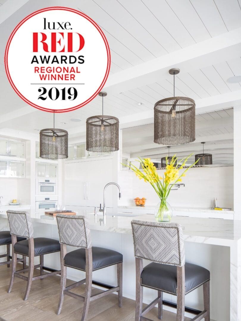 Luxury white kitchen with award sticker.