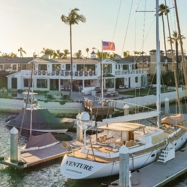 Beach house with large sailboat.