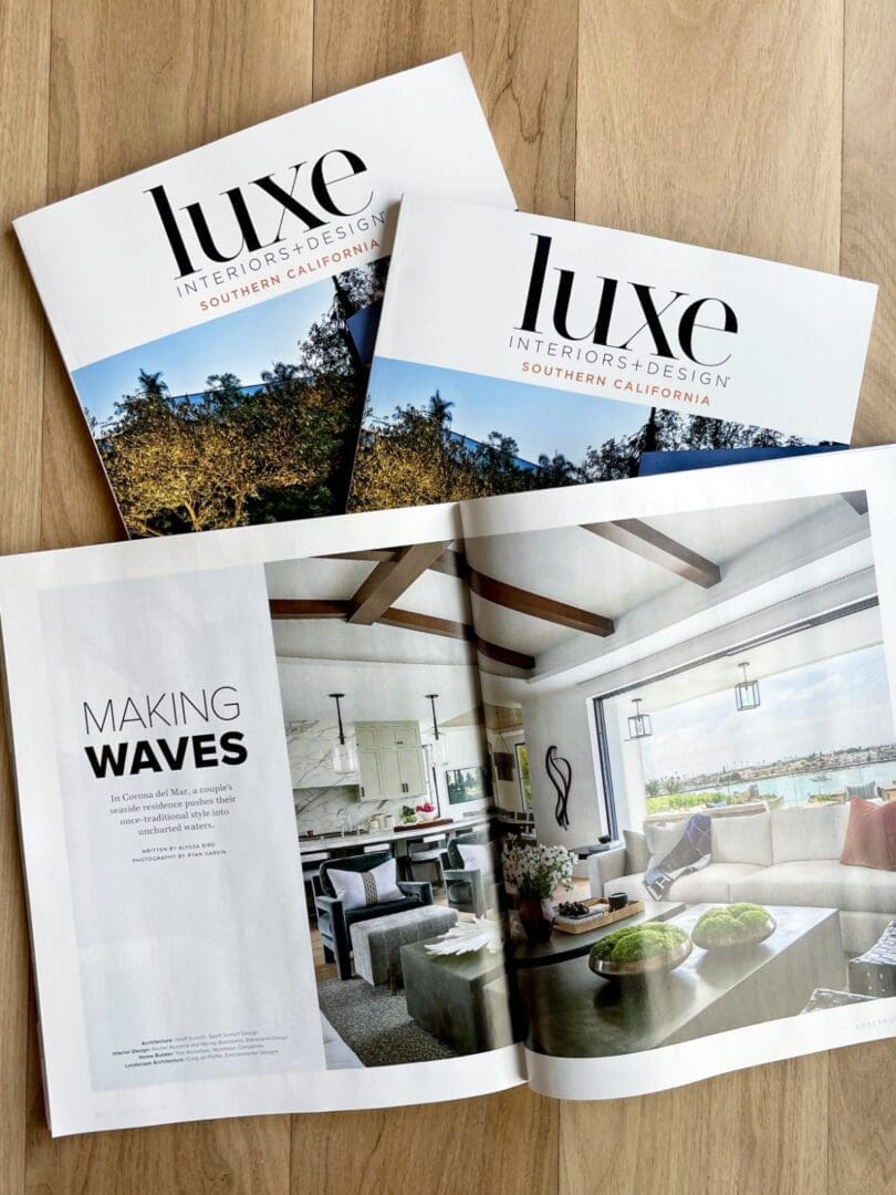 Magazines open to coastal home feature.