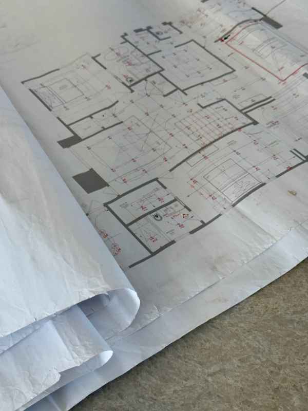 Blackband-Design-Hazel-Architectural-Plans Architectural plans at a home renovation site.