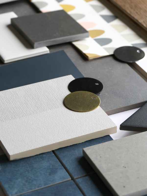 Blackband-Design-Mariner-Shores-Materials-Specification Tile and hardware samples arranged for an interior design presentation.