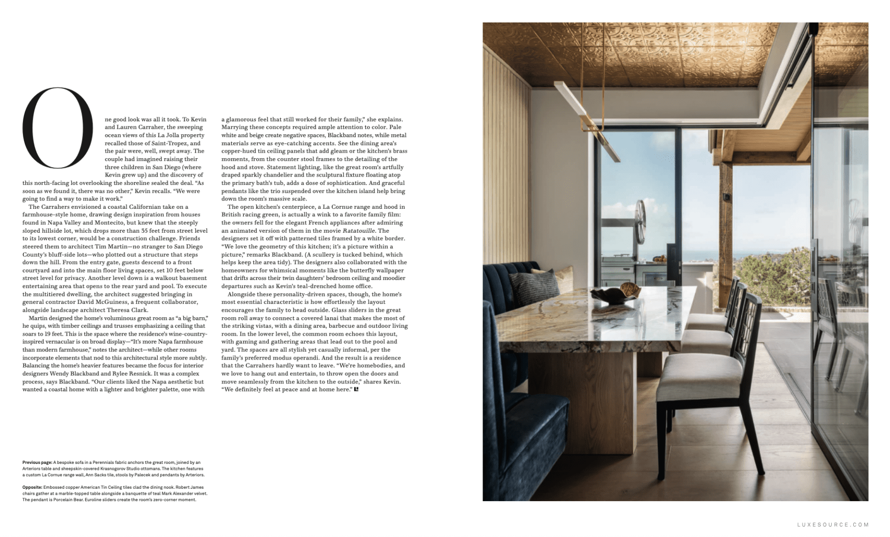 Marble table dining nook featuring teal velvet fabric seating and copper toned ceiling overlooking La Jolla.