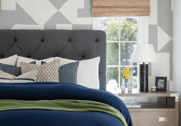 Blackband-Design-Blog-top-10-wallpapers Guest bedroom with patterned wallpaper and upholstered bed.