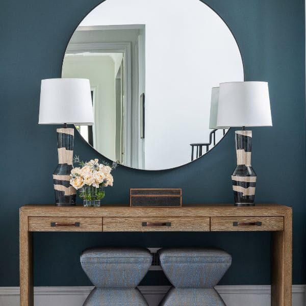 Entry way with teal wall paint.